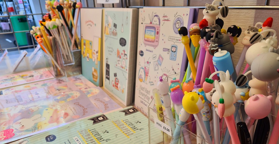 Notebooks and pens on display at the Kawaii Store in Plymouth Market